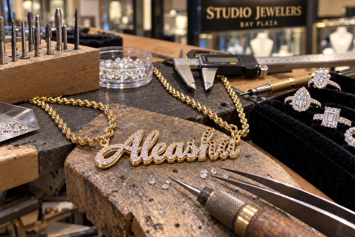 Aleasha Diamond Nameplate Workshop Master bench jeweler crafting custom gold jewelry and diamond rings at Studio Jewelers in Bay Plaza Shopping Center, Bronx NY.
